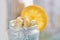 Healthy chia smoothie pudding in the glass jar with bananas decorated with orange on on the blurred background. Detox superfood