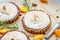 Healthy Christmas Meringue Tartlets with Orange Jam and Rosemary on the Light Wooden Background, Close Up View
