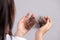 Healthy concept. Woman show her damaged long loss hair and looking at her hair on hand