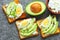 Healthy cottage cheese avocado toast with egg.