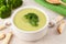 Healthy cream broccoli soup in a white dish