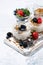 healthy creamy dessert with fresh berries, vertical top view