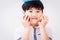 Healthy cute boy with fruit apple on white