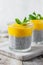 Healthy and delicious homemade vegan breakfast, simple and light meal - chia pudding prepared with coconut or rice milk with ripe