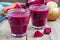 Healthy detox beetroot, carrot, apple and lemon juice smoothie, horizontal