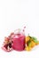 Healthy Detox Smoothies on a White Background With Fruits Citrus Grape Pomegranate Glass Jar of Tasty Smoothie Vertical