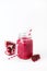 Healthy Detox Smoothies on a White Background With Fruits Citrus Grape Pomegranate Glass Jar of Tasty Smoothie Vertical