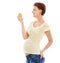 Healthy diet for the baby. A pregnant woman looking at a crunchy green apple while isolated on a white background.