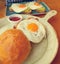 Healthy diet breakfast. Organic avocado toasts with fried eggs and Veal bacon toast. Selective focus.