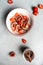 Healthy diet breakfast. overnight oatmeal with chia seeds and fruits figs, strawberries on a light background, top view