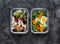 Healthy diet snack, breakfast lunch box on dark background, top view. Boiled egg, fresh vegetables and fruits - tasty healthy food