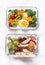 Healthy diet snack, breakfast lunch box on light background, top view. Boiled egg, fresh vegetables and fruits - tasty healthy