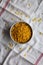 Healthy Dry Farfalline Pasta in a Bowl, top view. Flat lay, overhead, from above