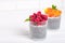 Healthy eating and dieting concept. Homemade white chia pudding with fresh berries. Two glasses,peach or apricot and raspberry.