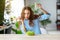 Healthy eating. happy young girl eating salad in morning in kitchen