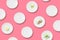 Healthy eating minimalist pattern. White plates with diet food on a pink background. Diet for weight loss