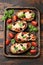Healthy Eggplant or Aubergine pizza with tomato sauce, mozzarella cheese, basil and olives