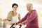 Healthy elderly woman on exercise bike