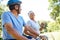 Healthy equals happy. a happy senior couple going for a bike ride and a jog together outdoors.