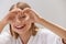 Healthy Eyes And Vision. Woman Holding Heart Shaped Hands Near Eyes