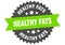 healthy fats sign. healthy fats round isolated ribbon label.
