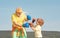 Healthy fighter Grandfather and grandson with boxing gloves. Grandfather and grandson doing boxing training in morning