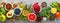 Healthy food background with fresh salmon fish, vegetables, berries and nuts. Top view. Banner