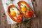 Healthy food: baked sweet potato with fried egg and tomato close