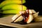 Healthy food bananas sprinkled with chocolate. Food on dark background.