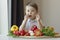healthy food, child eats fresh vegetables