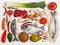 Healthy food clean eating selection: fruit, vegetable, seeds, fish, meat, leaf vegetable on white background. Top view