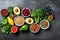 Healthy food clean eating selection: fruits, vegetables, seeds, superfoods and nuts on a dark background, Healthy food clean