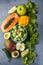 Healthy food clean food selection: fruits, vegetables, superfoods, leaf vegetable on a gray concrete background