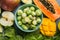 Healthy food clean food selection: fruits, vegetables, superfoods, leaf vegetable on a gray concrete background