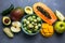 Healthy food clean food selection: fruits, vegetables, superfoods, leaf vegetable on a gray concrete background