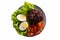 Healthy food, clean foods that contain brown rice, rice, tomatoes, boiled eggs, and green leafy lettuce. in a dish on a top view