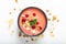 Healthy food by color of 2019 living coral Yogurt Breakfast Bowl with coconut, almond, flax seeds, Granola, and red currants in