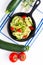 Healthy food concept homemade Guilten-Free Zucchini Noodles, Pasta with tomato in iron skillet pan