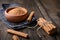 Healthy food condiment with medicinal properties, true Ceylon Cinnamon sticks and powder in a bowl