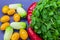 Healthy food Mini cucumbers, basil, Cherry tomatoes, chilli. blue background