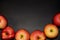 Healthy food. Ripe Red apples on black background for your design. Still life photography Black backgrounds. Space for text. Six a