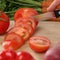 Healthy food tomato vegetables slicing on a kitchen board