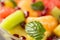 Healthy fresh fruit salad as a background