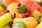 Healthy fresh fruit salad as a background