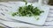 Healthy fresh micro greens falling onto a plate