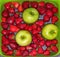 Healthy fresh tasty delicious fruit vegetarian food strawberries and green apples still life