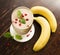 Healthy frozen cowberry and banana smoothie with mint closeup