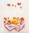 Healthy fruits and berries breakfast background. Glass jars with strawberries and mango smoothies on white table . Copy space