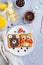 Healthy funny face sandwiches for kids. Animal faces toast with peanut and hazelnat chocolate butter