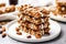 healthy granola bars stacked on a white plate